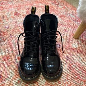 Dr. Martens 1460 Leather Combat Lace-Up Lug Sole Boot in Shiny Black Patent.